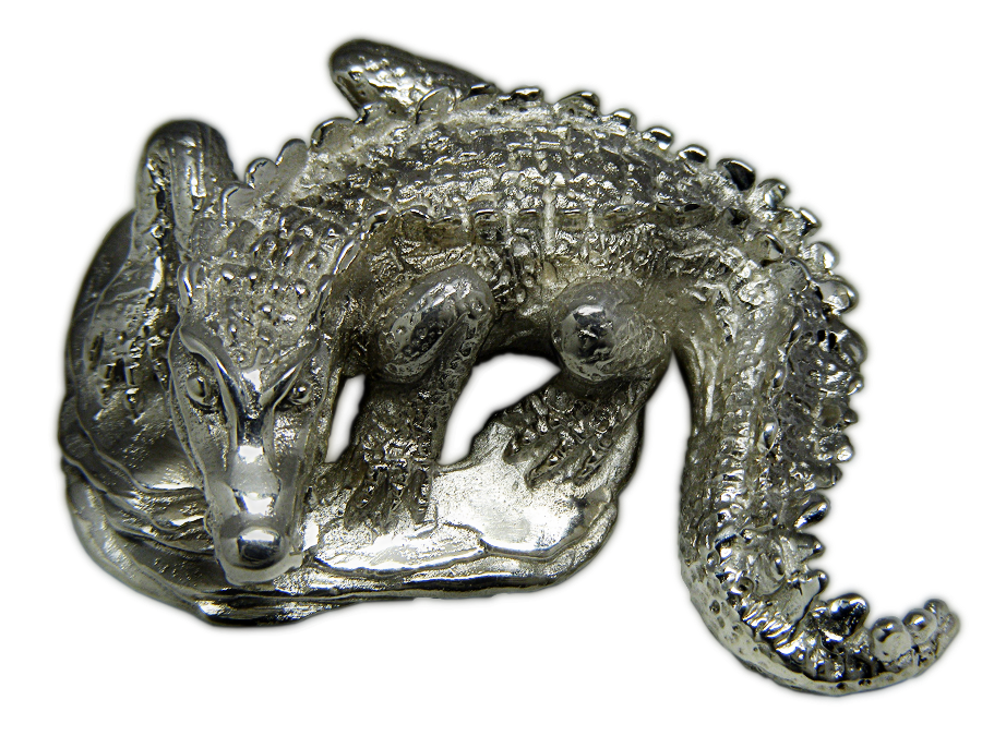 Broche artesanal en plata de un Cocorilo